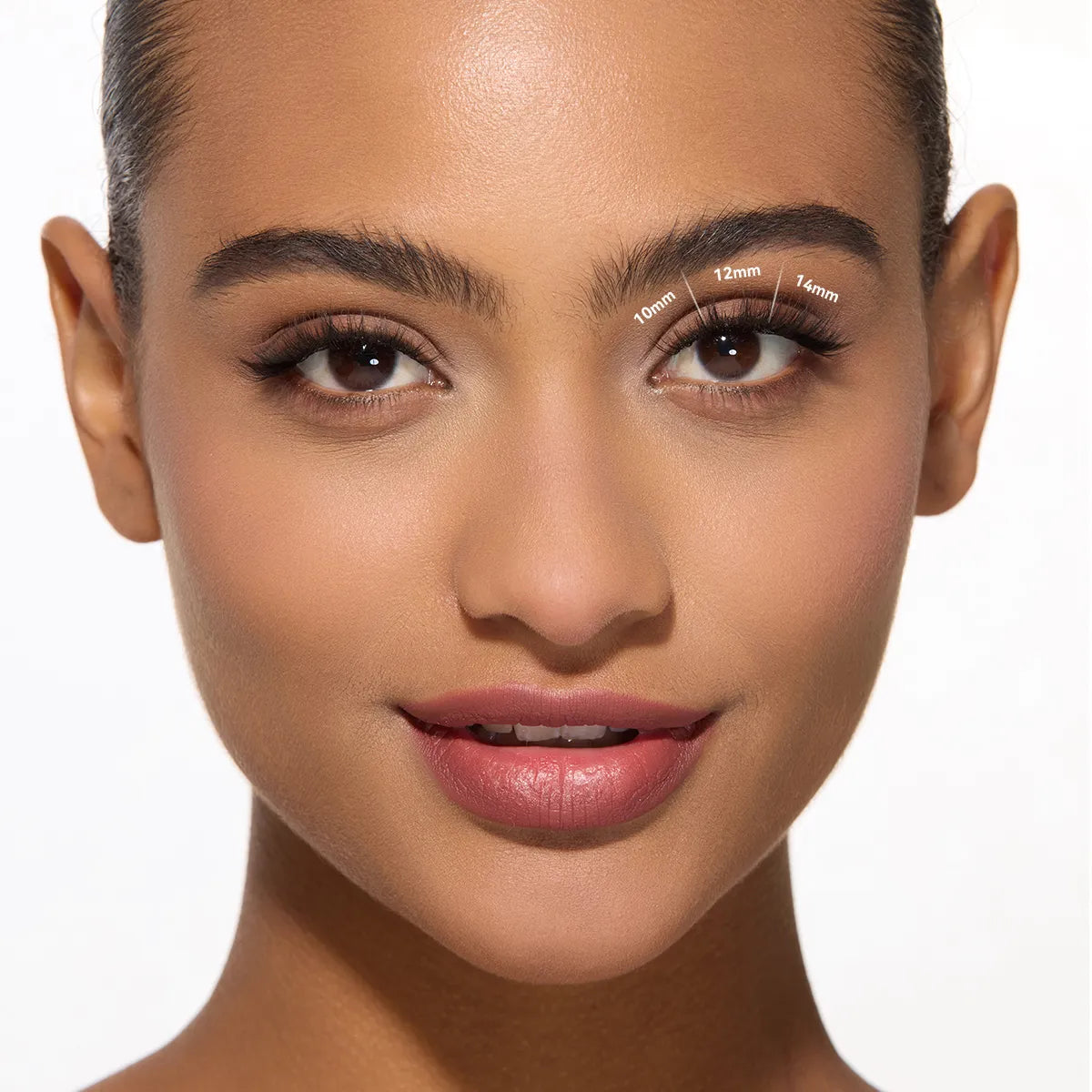 Close-up of a woman's face with makeup application lines on her face.