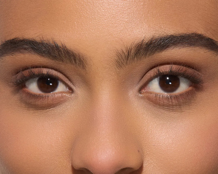 Close-up of a person's eyes with a focus on the skin texture.